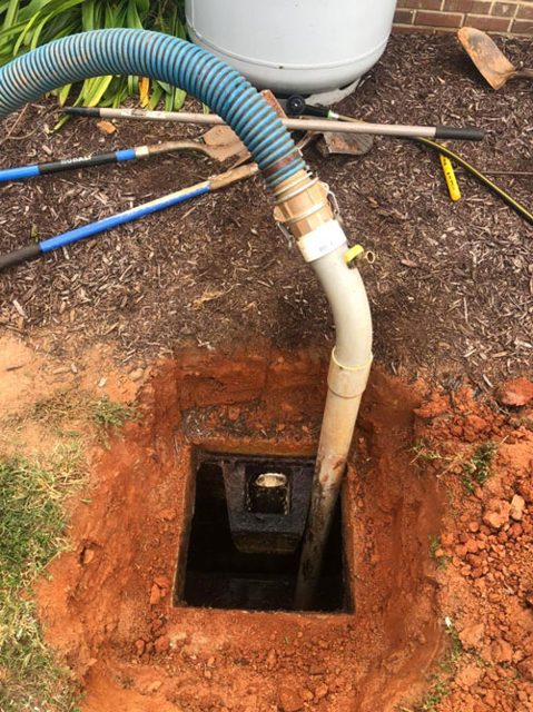Stock photo of septic tank pumping