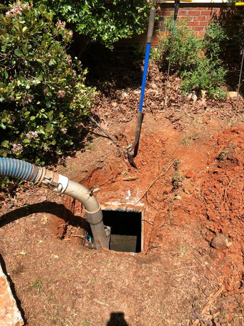 Stock photo of septic tank pumping